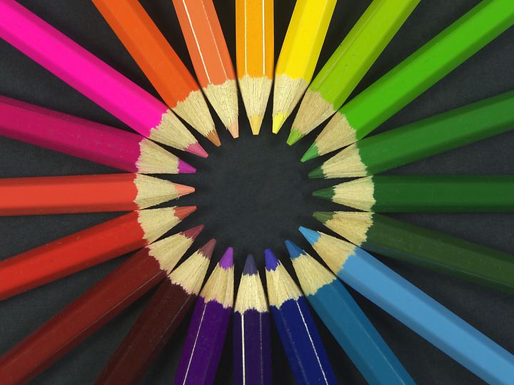 A row of sharpened coloured pencils