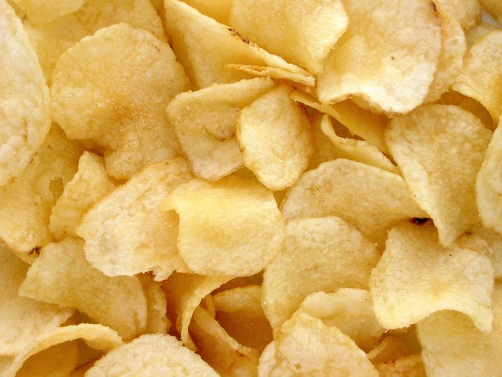 A pile of golden potato chips