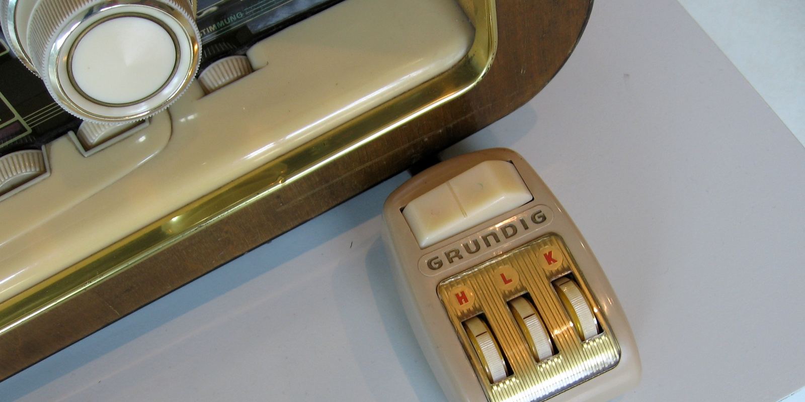 A vintage television remote control with large buttons