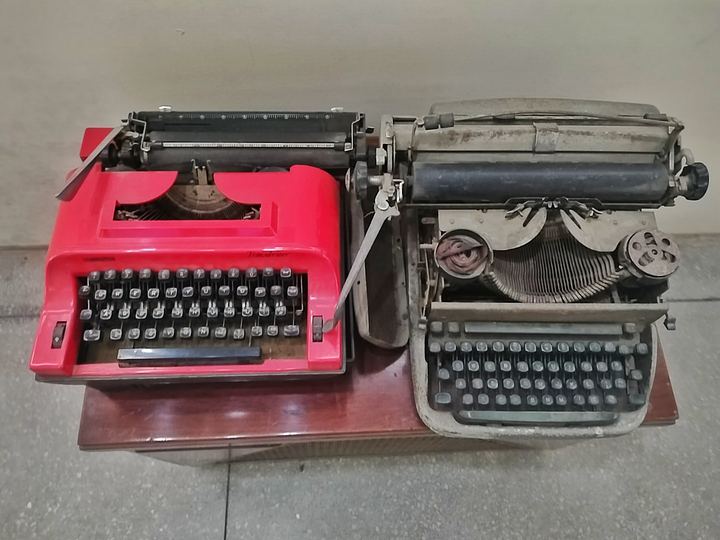 A vintage manual typewriter with round keys