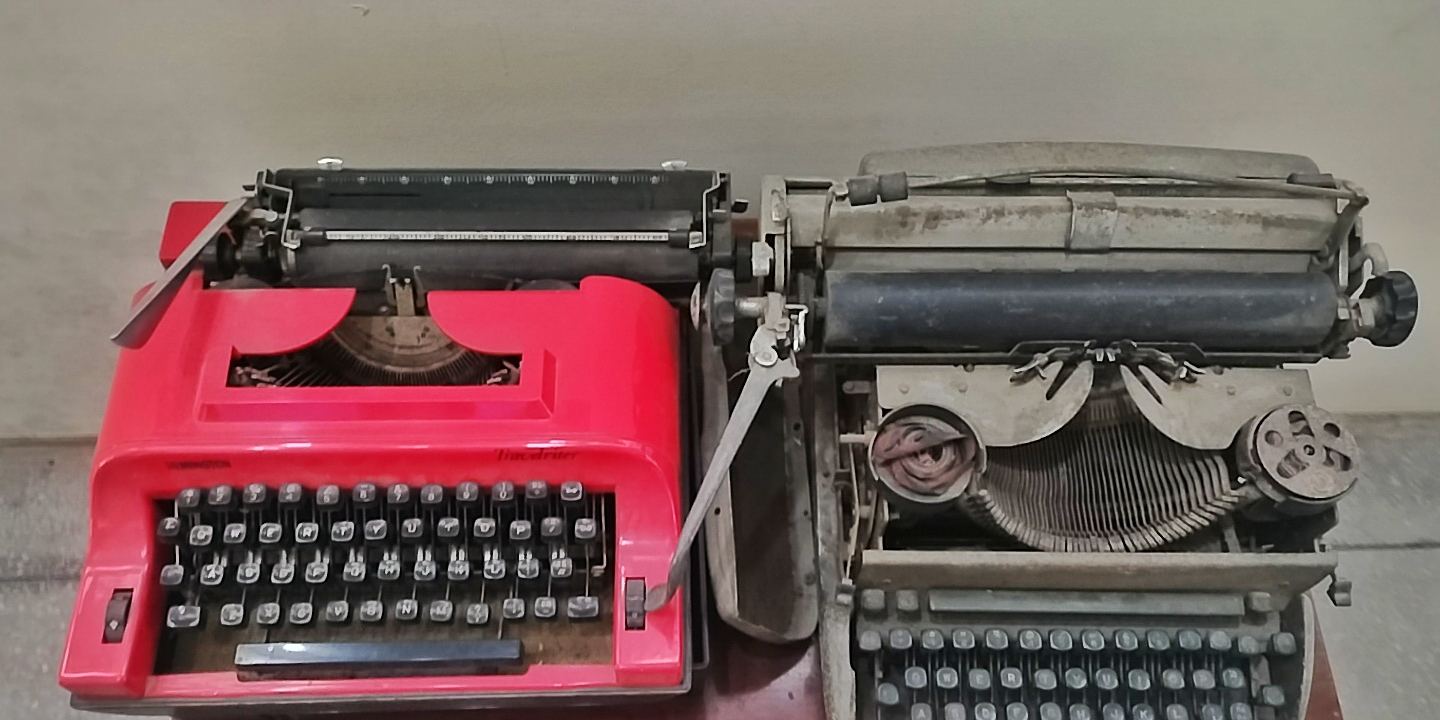A vintage manual typewriter with round keys
